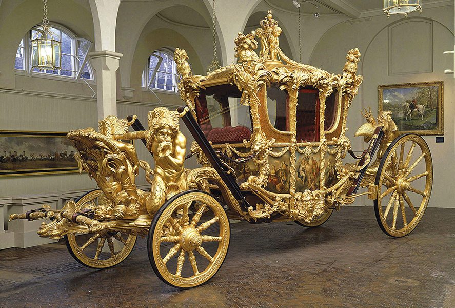 The Royal Mews, Buckingham Palace
	
27 March – 31 October 2004

The Gold State Coach
	
The Royal Collection © 2004, Her Majesty Queen Elizabeth II

This photograph is issued to end-user media only. It may be used once only and only to preview or review the opening of the Royal Mews 2004. Photographs must not be archived or sold on.

Public Relations & Marketing, the Royal Collection: 020-7839 1377